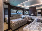 Bedroom with two single beds on Mowana Yacht