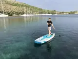 Guest using a paddle board.