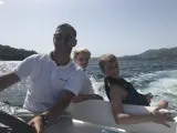 Danny with two young guests cruising in the diesel inflatable boat